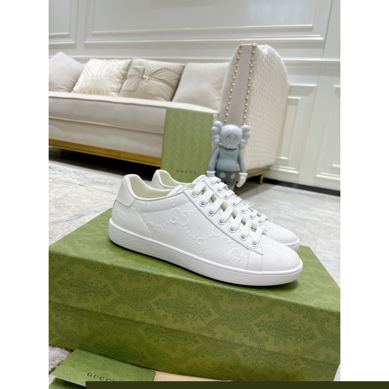 G*u*i sneakers